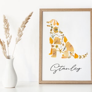 Framed golden retriever pressed-flower wall art with cursive personalization, matte paper.
