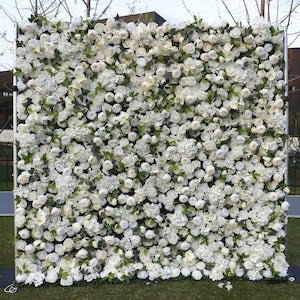Artificial flower wall with dense white peony-style blossoms and green stems, full panel