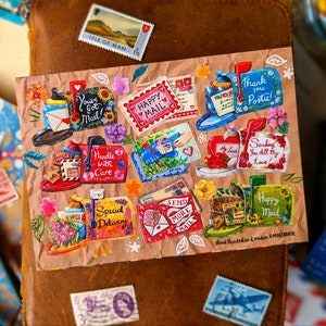 Mail-themed sticker sheet set with colorful envelopes, stamps, and postcards