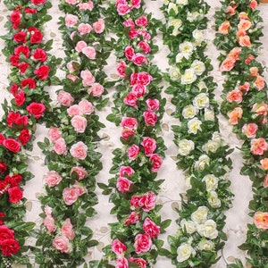 Artificial rose vine wall decal garland with red, pink, and white flowers