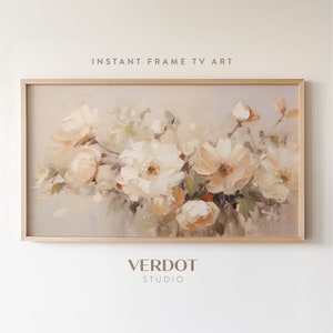 Framed floral TV wall art with pale cream flowers and beige background