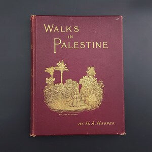 Antique book with maroon cover and gold title "Walks in Palestine" with illustration
