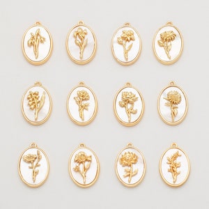Set of gold-plated oval flower charm pendants with mother-of-pearl inlay