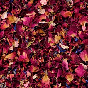 Biodegradable dried confetti petals in mixed pink, purple, and yellow tones