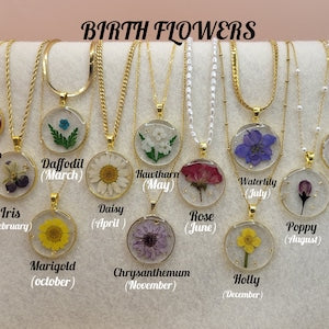 Gold-tone birth month flower necklace set with round enamel flower pendants