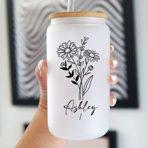 White iced coffee tumbler with clear lid, black floral line art and name "Ashley"