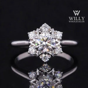 Flower-shaped halo wedding ring with round center stone on silver band