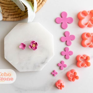4-in-1 flower petal polymer clay cutter set; pink and orange flower clay pieces