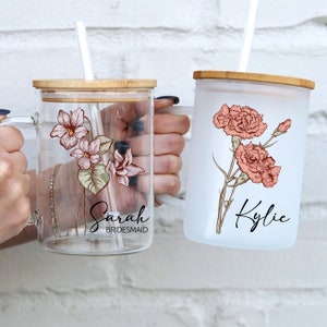 Set of 2 clear glass mugs with wooden lids, straws, and floral birth flower art with names