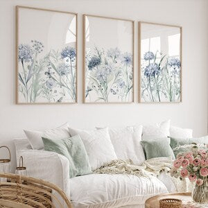 Set of three framed wildflower botanical prints with blue flowers on white mats