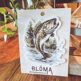 Fish vinyl sticker on backing card, showing a leaping bass with trees and water scene.