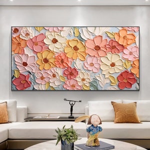 Abstract floral oil painting on canvas with pink and peach 3D flowers, rectangular frame