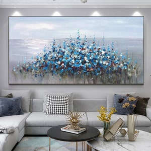 Large canvas oil painting with abstract blue flowers over a seascape, horizontal wall art