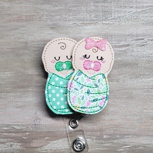 Newborn swaddle blanket set with green dotted and floral fabric