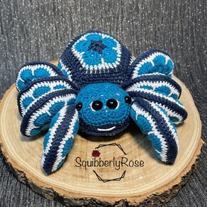Blue and white striped crochet spider pattern, PDF—blue plush body with legs.