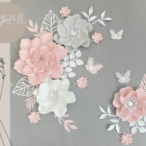 Pastel paper flower wall decor set with pink, white blooms and leaf cutouts