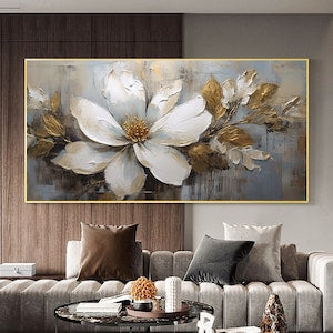 Large floral oil painting on canvas with white blossom and gold abstract petals, in gold frame