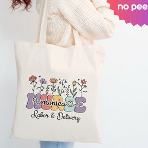 Cream canvas tote bag with retro flower graphic and Labor & Delivery text