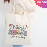 Cream canvas tote bag with retro flower graphic and Labor & Delivery text