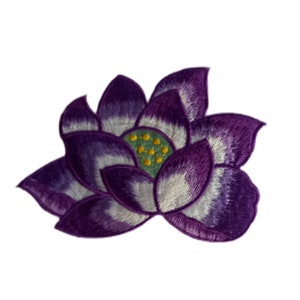 Purple flower crest patch with stitched petal design and central blue detail