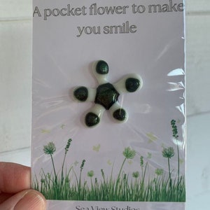 Handcrafted glass flower pocket charm on gift card