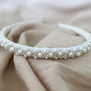 White pearl and rhinestone beaded headband with scalloped center