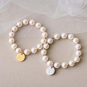 Pearl flower girl bracelet set with white bead strands and round initial charms (B, L)