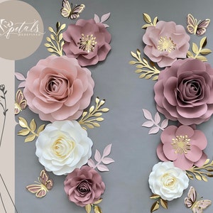 Paper nursery flower wall decor: dusty rose, purple, and white blooms with butterflies