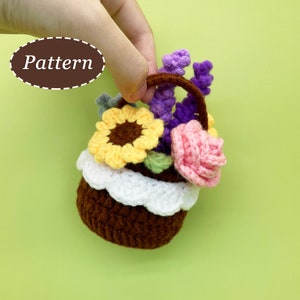 Mini crocheted flower basket with purple, yellow, and pink flowers