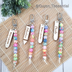 Personalized clay bead cervical dilation tool with clip, multicolor beads