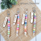 Personalized clay bead cervical dilation tool with clip, multicolor beads