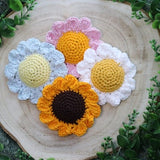 Crochet catnip and silvervine flower toy with yellow, orange, blue petals