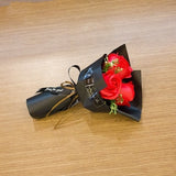 Mini rose bouquet gift with red rose and black wrap bow