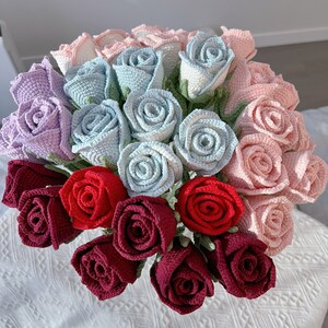 Handmade crochet rose bouquet with pink, light blue, lavender, and red roses