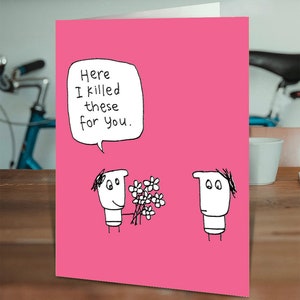 Funny birthday card: two cartoon figures with flowers and note 'Here I killed these for you'