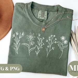 Olive green t-shirt with white wildflower line art and small front pocket