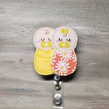 Swaddled Baby Boy and Girl | yellow and daisy blanket | baby burrito | labor and deliver | L&D | NICU | mother and baby | newborn | preemie