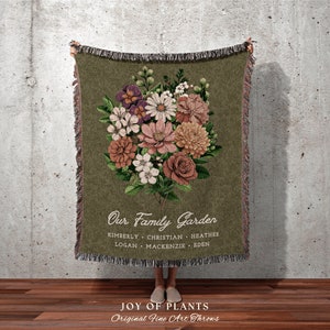 Woven birth-flower blanket with family names and a bouquet of flowers design