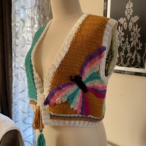 Multicolor crochet vest with 3D butterfly and floral appliques, fringe hem