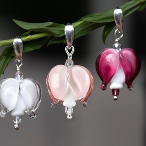Sterling silver heart-shaped glass pendant with drop beads, three colored designs