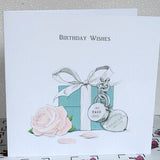 Birthday Wishes greeting card with watercolor rose, gift box and heart illustration