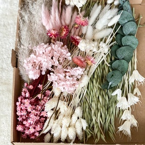 DIY dried flower bouquet set with pink, white and green dried blooms and foliage