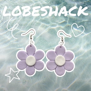 Handmade polymer clay flower earrings, lavender with cream centers and silver hooks