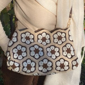 Handmade crochet African flower bag with owl-like floral motifs, cream and dark brown