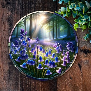 Round faux stained glass garden sign with purple bluebells and leafy border