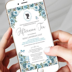 Dusty blue floral electronic invitation card with teacup and cameo silhouette shown on phone