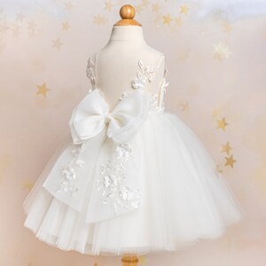 Ivory tulle flower girl dress with bow and embroidered lace bodice