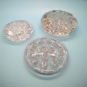 Clear glass flower frog set, three oval pieces with multiple raised holes