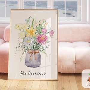 Framed birth flower bouquet print with pastel blooms in a vase, botanical illustration