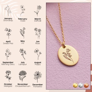 Gold-tone necklace with round pendant and small birth-flower engraving